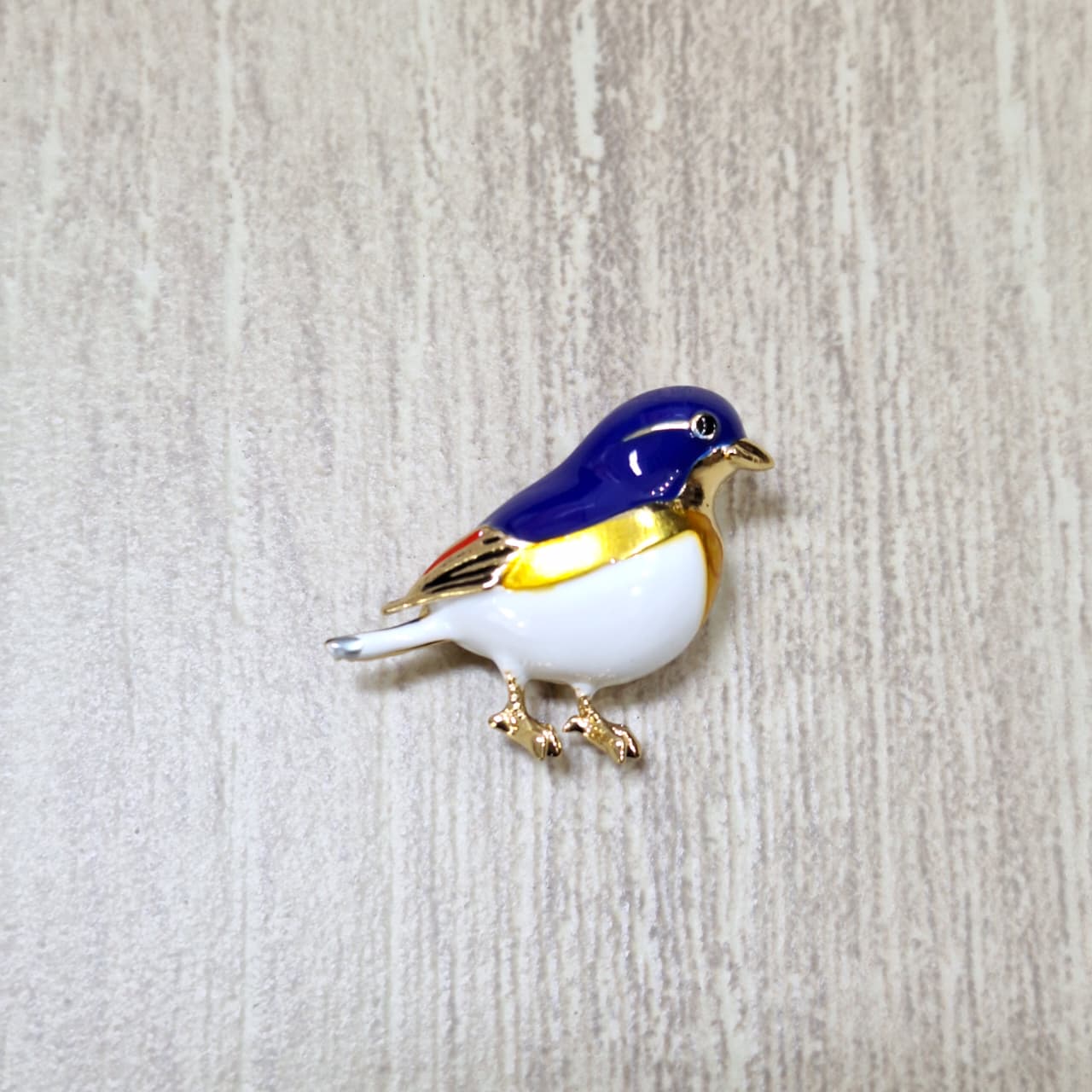 Prendedor pajarito azul Bisutería